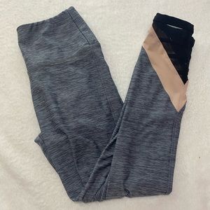 Pink leggings with mesh window on ankle